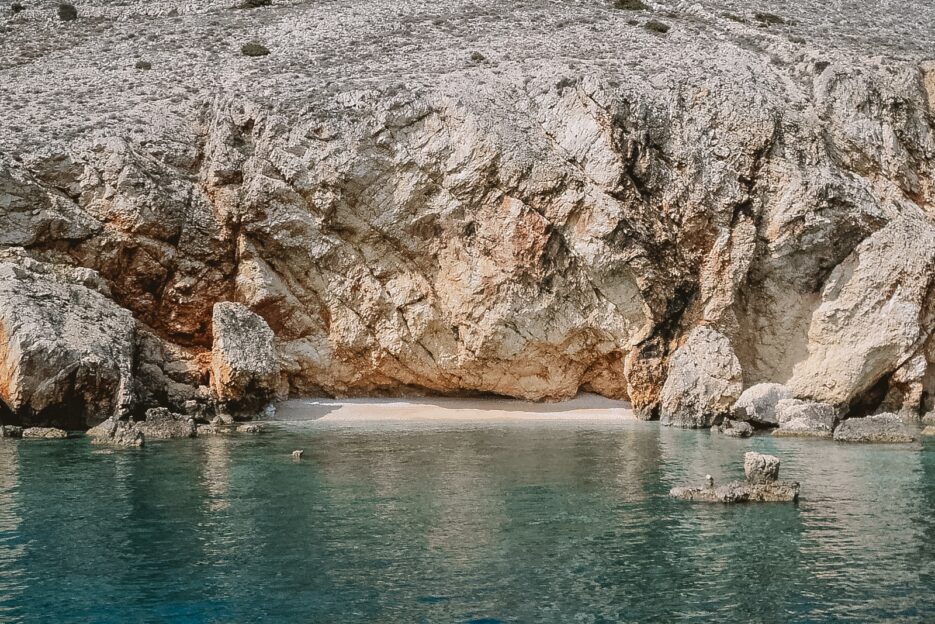 Small secluded beach in Koromačna bay, Cres, Croatia